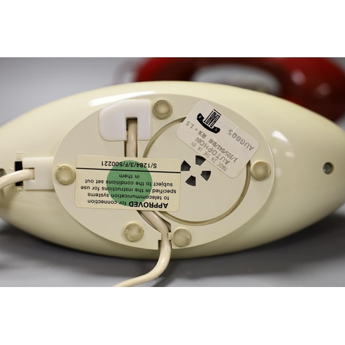 1341 - Two Autophon telephone handsets, AUG002 and AUG005,24 cms wide,