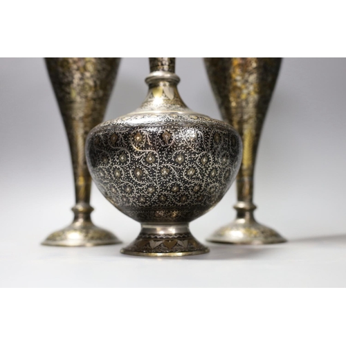 1343 - A pair of Indian damascened brass vases and a similar vase,pair of vases 33cms high,