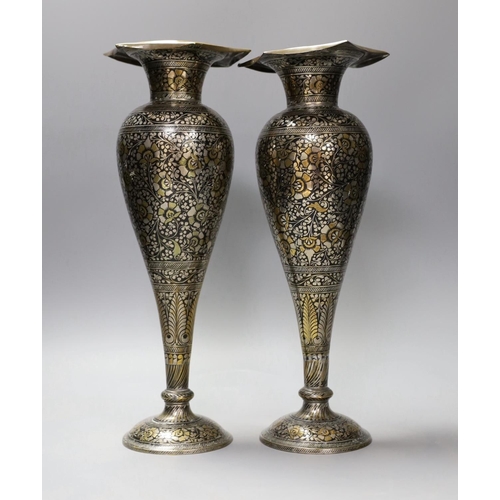 1343 - A pair of Indian damascened brass vases and a similar vase,pair of vases 33cms high,