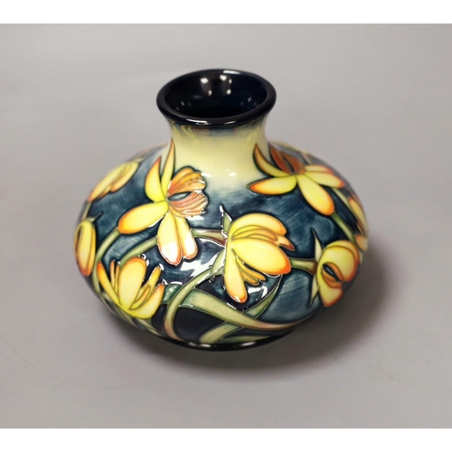 1359 - A Moorcroft pottery squat shaped vase, decorated with the "Celandine" pattern designed by ... 