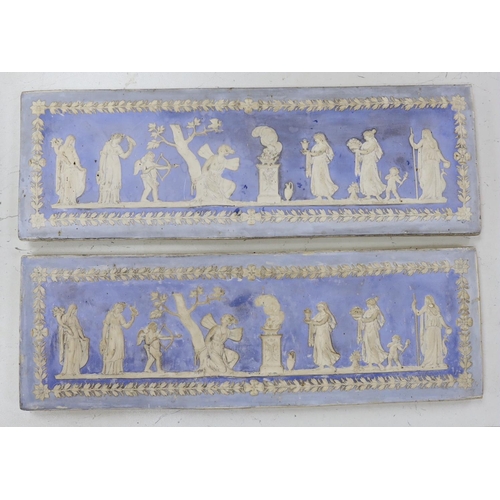 1362 - A pair of 19th century blue tinted moulded plaster plaques, imitating Wedgwood jasper ware,45cms wid... 