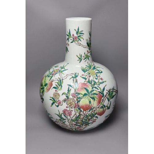 1363 - A large Chinese famille rose nine peach bottle vase,58cms high,