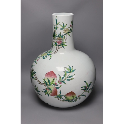 1363 - A large Chinese famille rose nine peach bottle vase,58cms high,