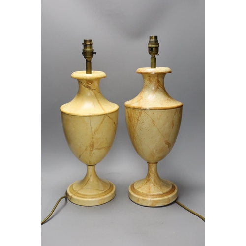 1364 - A pair of faux marble toleware style lamps,41 cms high not including fittings,