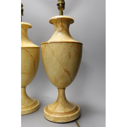 1364 - A pair of faux marble toleware style lamps,41 cms high not including fittings,