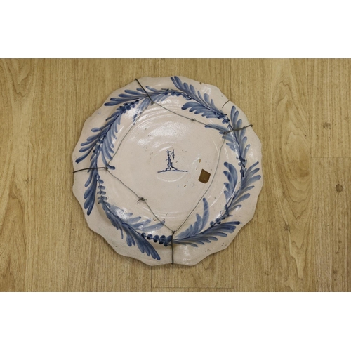 1381 - An Italian maiolica armorial dish, Savona, 19th century, hangman mark, 44cm diameter