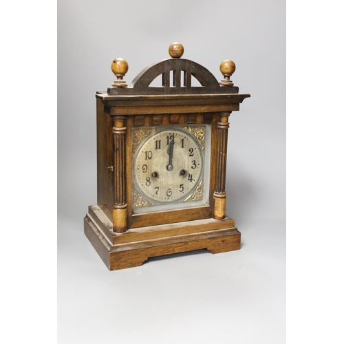 1386 - A German walnut mantel clock 37cm