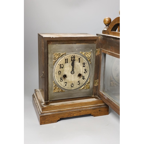 1386 - A German walnut mantel clock 37cm