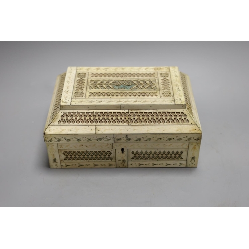 1387 - A 19th century prisoner of war fretted bone box, 21.5cm wide