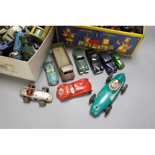 1392 - A collection of 1940/50s Dinky Toys, and various hollow-cast lead toy soldiers