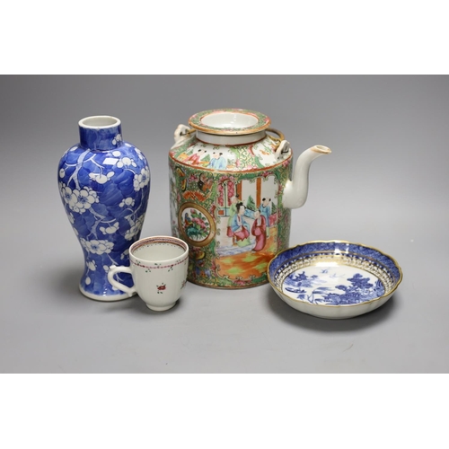 1398 - A Chinese famille rose teapot and cover, a blue and white prunus vase, a saucer and a coffee cup, 18... 