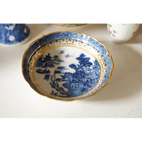 1398 - A Chinese famille rose teapot and cover, a blue and white prunus vase, a saucer and a coffee cup, 18... 