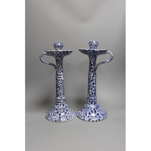 1409 - A pair of Wood & Sons tall blue and white candlesticks and a Delft blue and white cornucopia wall po... 