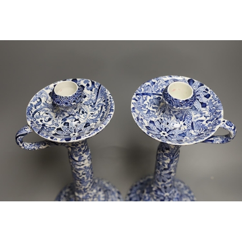 1409 - A pair of Wood & Sons tall blue and white candlesticks and a Delft blue and white cornucopia wall po... 