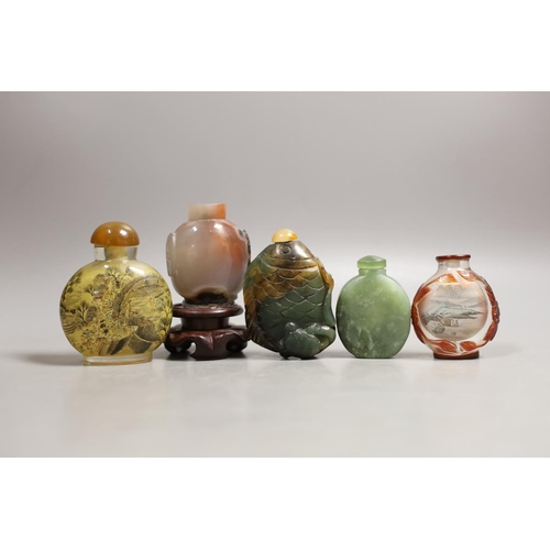 1410 - Five Chinese jade, glass and hardstone snuff bottles, the largest 7cm