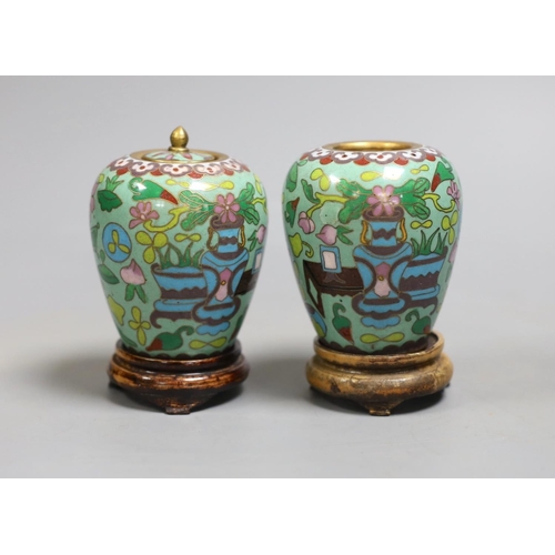 1415 - A pair of Chinese cloisonné enamel jars, wood stands, 9cm