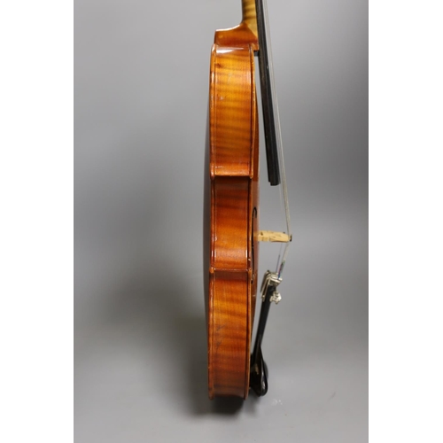 1453 - A cased child's violin and bow with ivorine tip, violin 55cms long,