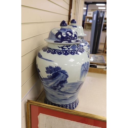 1479 - A pair of large Chinese blue and white jars and covers, 75 cms high.