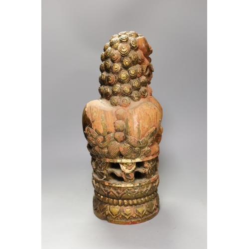 1491 - A South East Asian painted wood Buddhist lion