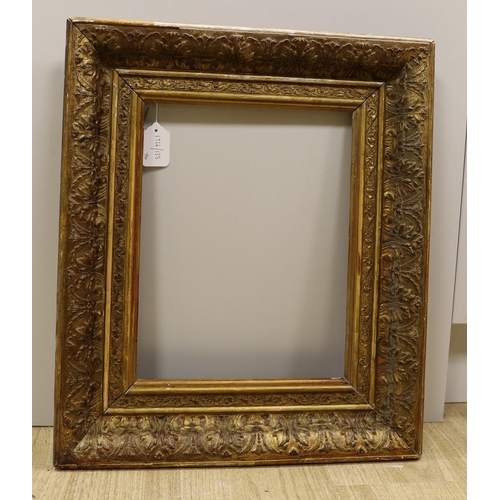 1565 - A 19th century giltwood and gesso picture frame, aperture 35 x 27cm, an embossed metal plaque and fi... 