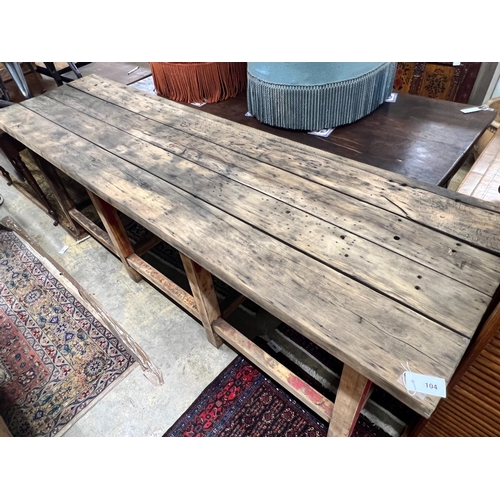 104 - A planked top part painted work bench, width 242cm, depth 68cm, height 84cm