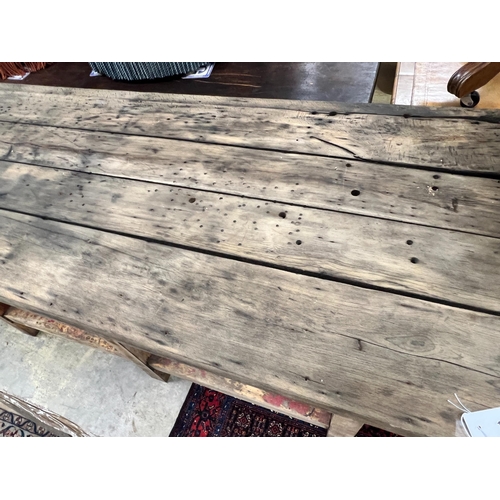 104 - A planked top part painted work bench, width 242cm, depth 68cm, height 84cm