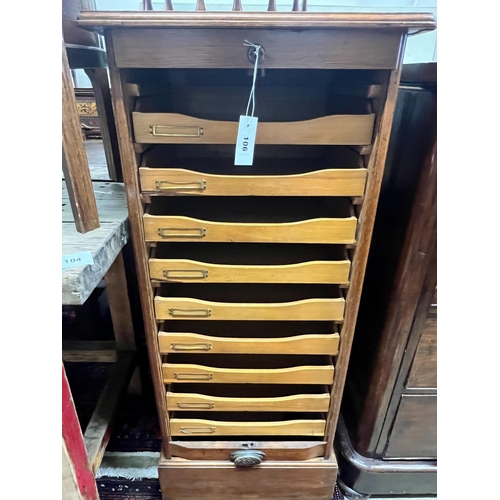 106 - An early 20th century oak tambour filing cabinet, width 50cm, depth 42cm, height 115cm