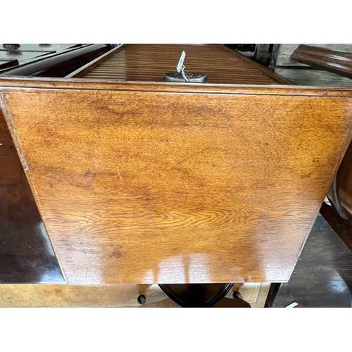 106 - An early 20th century oak tambour filing cabinet, width 50cm, depth 42cm, height 115cm