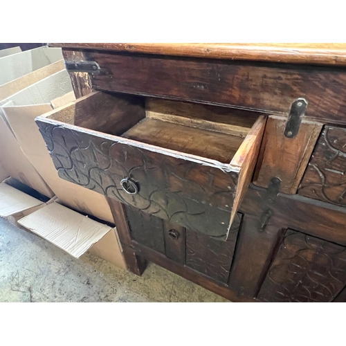 122 - An Indian carved hardwood side cabinet, width 97cm, depth 41cm, height 93cm