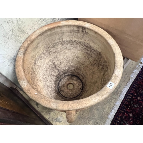 147 - A circular terracotta planter, diameter 56cm, height 47cm