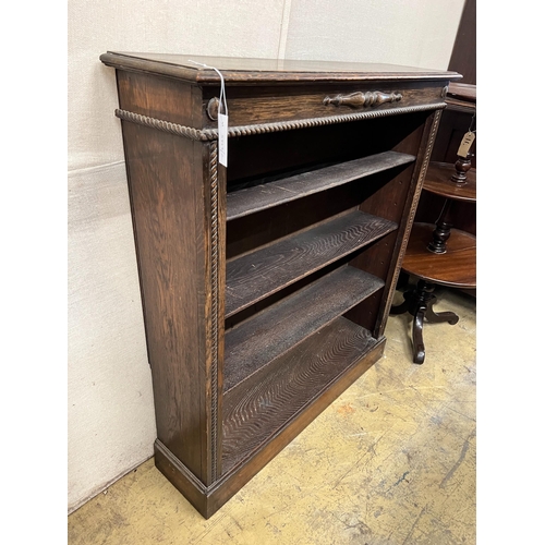 149 - A 1920's oak open bookcase, length 99cm, depth 25cm, height 108cm