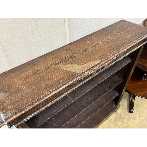 149 - A 1920's oak open bookcase, length 99cm, depth 25cm, height 108cm