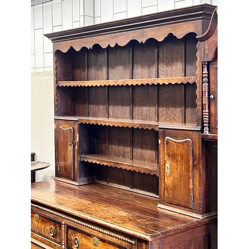 152 - A Victorian oak dresser with boarded rack, width 148cm, depth 58cm, height 206cm