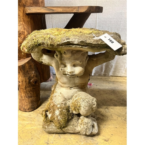 156 - A reconstituted stone Faun garden seat, width 48cm height 46cm