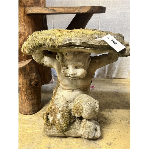 156 - A reconstituted stone Faun garden seat, width 48cm height 46cm