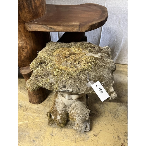 156 - A reconstituted stone Faun garden seat, width 48cm height 46cm