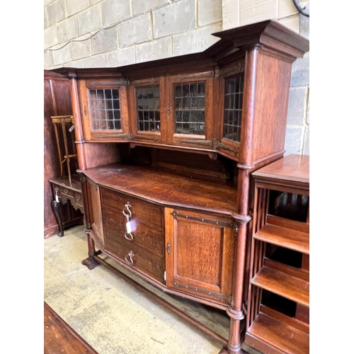 161 - An early 20th century Arts & Crafts copper mounted oak sideboard in the manner of Shapland and Pette... 