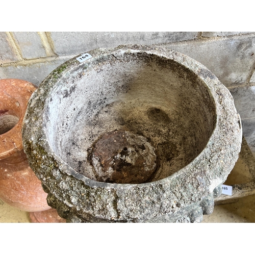 164 - A reconstituted stone circular garden fountain, diameter 43cm, height 84cm