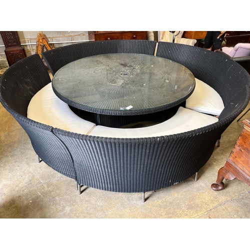 171 - A large Westminster black all weather rattan circular topped garden table, diameter 180cm, height 74... 