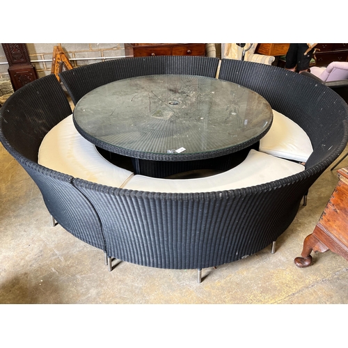 171 - A large Westminster black all weather rattan circular topped garden table, diameter 180cm, height 74... 