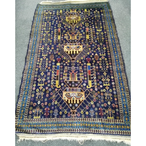 191 - An Afghan blue ground rug, 180 x 112cm