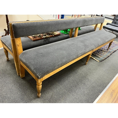 193 - A pair of late Victorian pale oak upholstered benches, length 242cm, depth 48cm, height 80cm