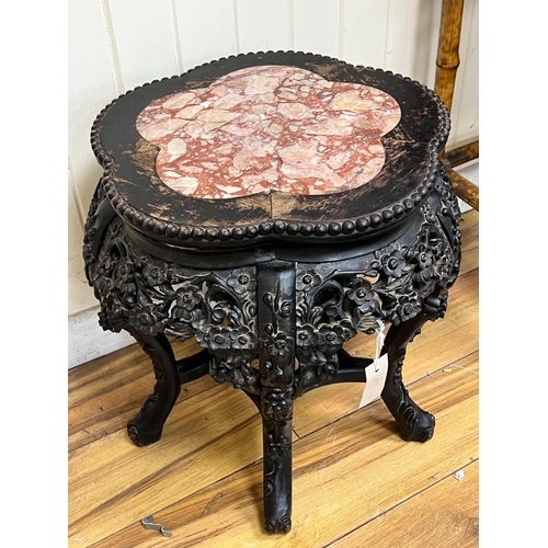 199 - A Chinese carved hardwood marble topped jardinière stand, width 46cm, height 47cm