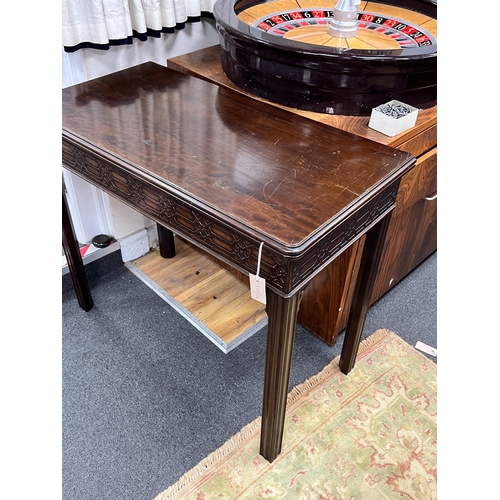 209 - An Edwardian Chippendale revival rectangular mahogany folding card table, width 91cm, depth 46cm, he... 