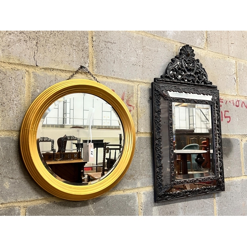 21 - A 19th century style French embossed metal wall mirror, width 43cm, height 72cm together with a circ... 