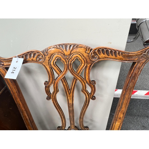 214 - A pair of George III carved mahogany dining chairs