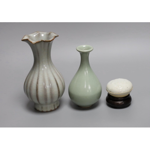 257 - A Chinese celadon ground bottle vase, a similar crackle glazed vase, a paste box with cover and stan... 