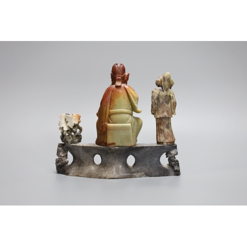 259 - A Chinese soapstone deity figure group, 20cm wide