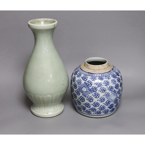 261 - A Chinese celadon ground vase and a similar blue and white jar, tallest 30cm