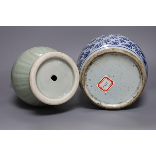 261 - A Chinese celadon ground vase and a similar blue and white jar, tallest 30cm